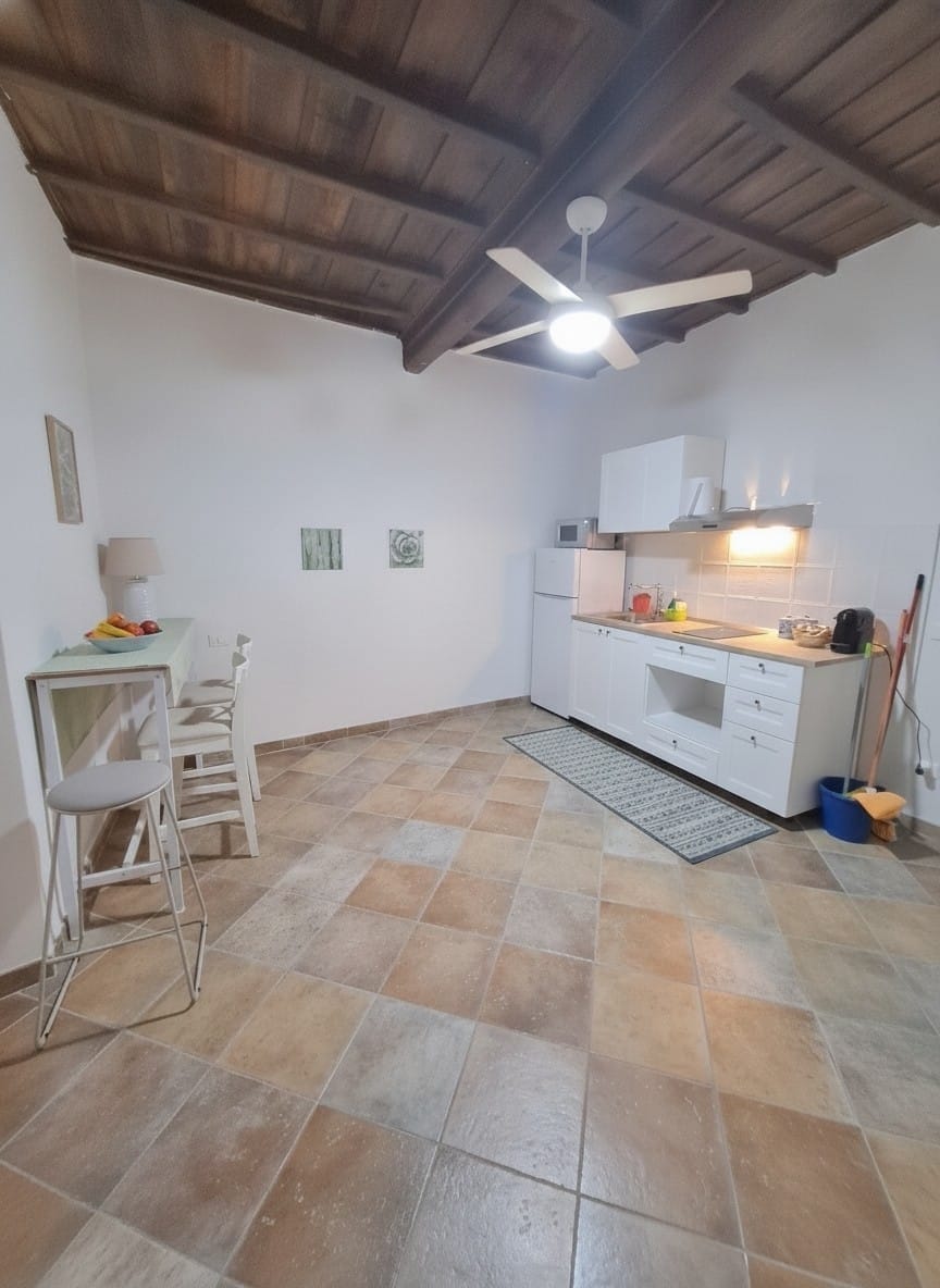 Cucina con travi a vista